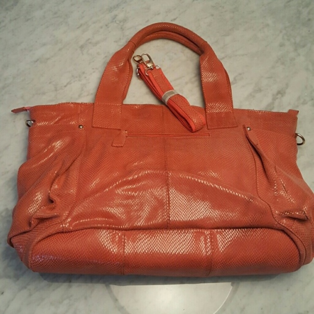 Unique salmon color leather handbag